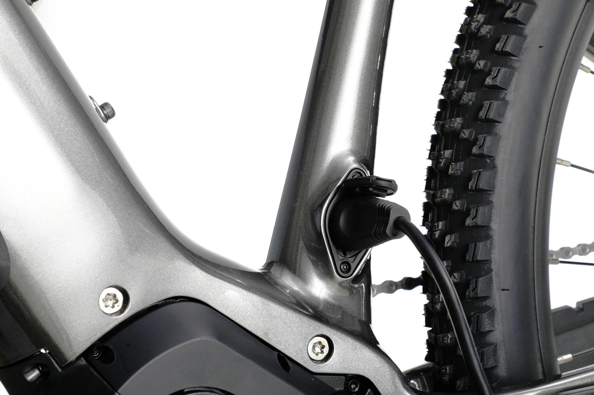 Close up of aventon ramblas charging port with cable plugged in.
